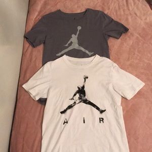 Two Nike air Jordan T- shirts.